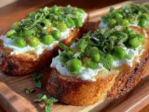 fresh spring pea and mint crostini - featured image