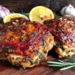 crispy baked lemon herb chicken thighs - featured image