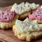 crown-shaped sugar cookies with royal icing - featured image